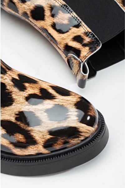 Ozzo Woman Leopar desenli kadın bot