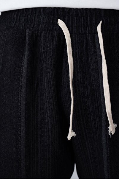 TÜZeMEN Textured Baggy Fabric Trousers with Rope Detail