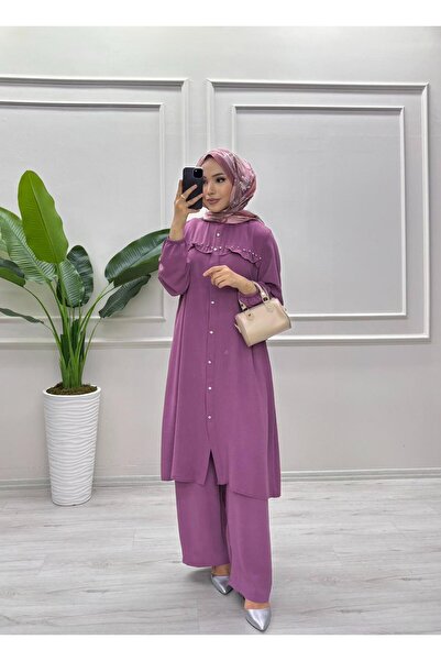 moda acar طقم بتفاصيل حجرية وحواف مكشكشة في الأمام