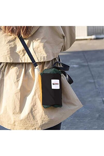 Samar Styli Crossbody Bag - Lightweight and versatile, adjustable strap, elegant black color, comfortable on the go.