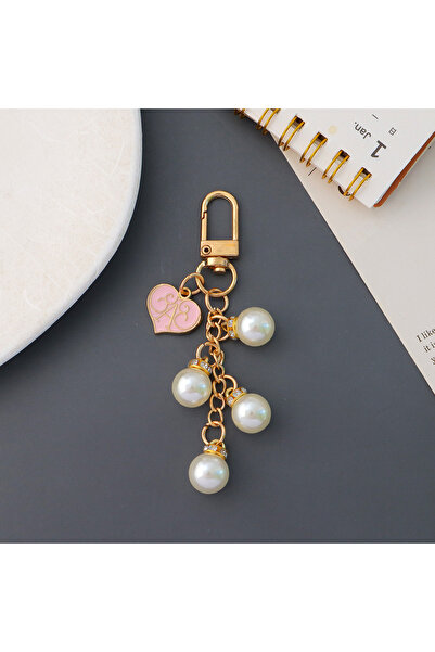Hilosh Breloc auriu cu inimă roz și detaliu de perlă – Ornament pentru geantă...