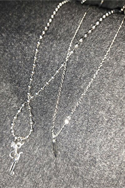 AYYILDIZ مجموعة من قطعتين من قلادات معدنية على شكل رصاصة ومسدس