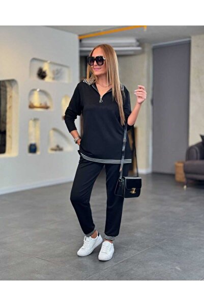 Kokosh moda طقم بلوزة وبنطلون نسائي من الفيسكوز بتفاصيل مخططة وياقة بسحاب