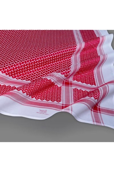 Al Bassam Al Bassam's distinctive red shemagh