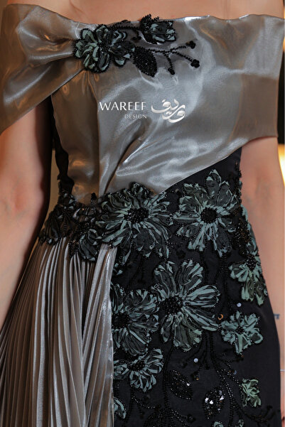 WAREEF FASHION Black and light olive dress decorated with embroidery and a side tail