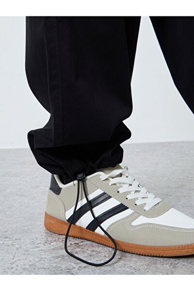 Styli Men Black Relaxed Fit Paneled Pants