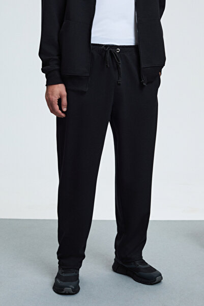 GRIMELANGE Griffin Men's Black Sweatpants with Elastic Waistband and Metal Bird's Eye Detail