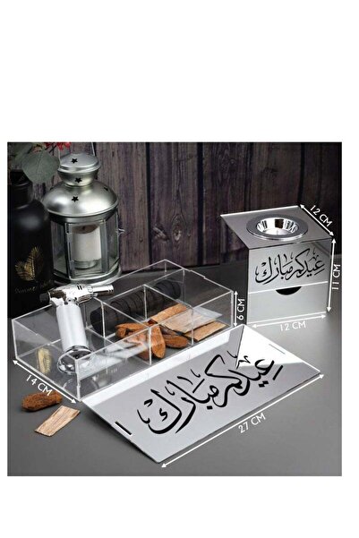 Story of candle Incense burner with a box for storing incense, bearing the phrase "Eid Mubarak," along with Maroki oud and Vietnamese oud chips, a lighter, and charcoal.