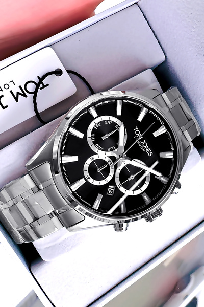 Tom Jones ساعة يد لندن للرجال 3 أتم مقاومة للماء باللون الفضي وسوار فولاذي TJ...