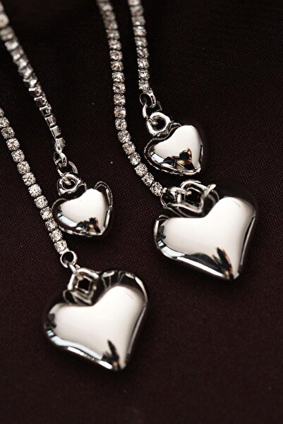 YİĞİTKARANAKSESUAR ÇELİK GÜMÜŞ RENK TAŞLI BOMBE KALPLİ SALLANTILI KÜPE