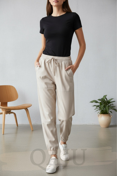 Qaju Pantaloni din piele de culoare piatră, cu șireturi în talie și cusături la genunchi