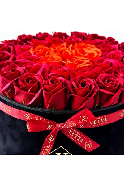 velve Majestic Floral Arrangement, with burgundy, red and orange soap roses, in a black velvet box