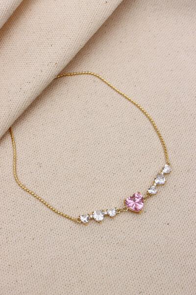 LA PERRY ACCESSORIES سوار VIP ذهبي اللون مع حجر القلب الوردي