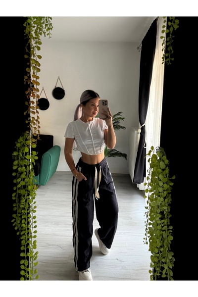 by SLA boutique Wide-leg streetwear pants with side stripes