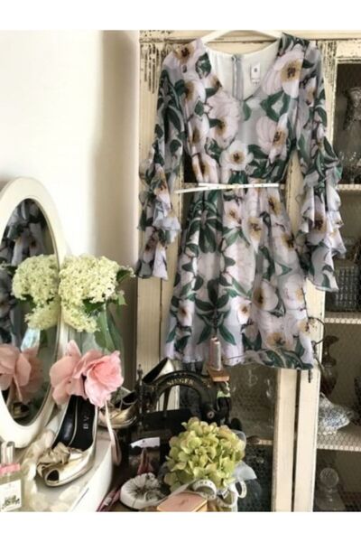 Betty M Short floral veil cocktail dress with long sleeves