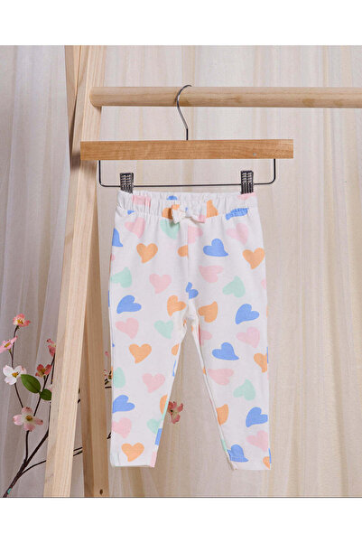 REDTAG بنطال ضيق مطبوع عليه قلب أبيض للبنات الرضع