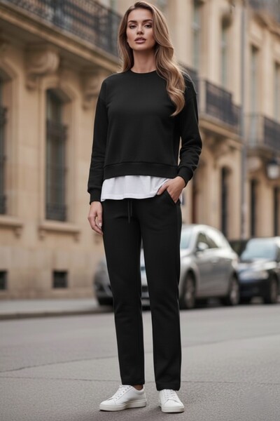 The Γυναικείο Σετ Φούτερ και Παντελόνι με λεπτομέρεια στο κάτω μέρος της φούστας- Μαύρο/Μελανζέ/Γκρι