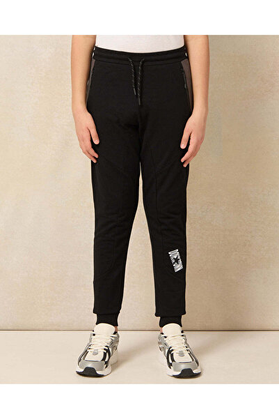 REDTAG بنطال رياضي أسود للأولاد الكبار، مقطوع ومخيط