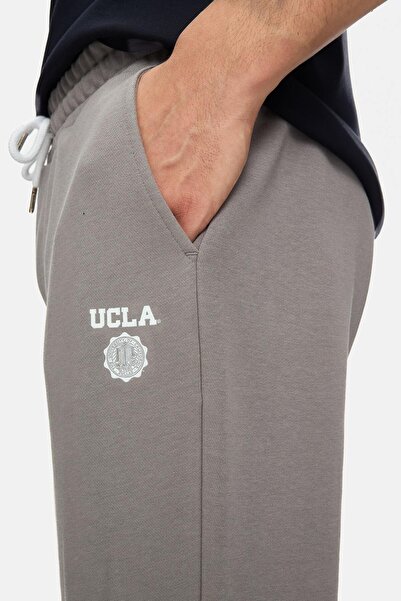 UCLA Ανδρικό παντελόνι αθλητικής φόρμας LUSKIN Graphite Shrinkable Cut με τύπωμα Standard Fit με ελαστικό κάτω μέρος