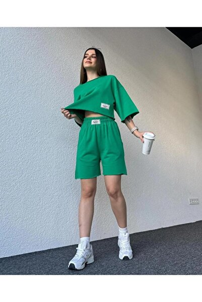 LUSHN طقم تي شيرت وشورت سفلي مطبوع للجنسين من Cappitone