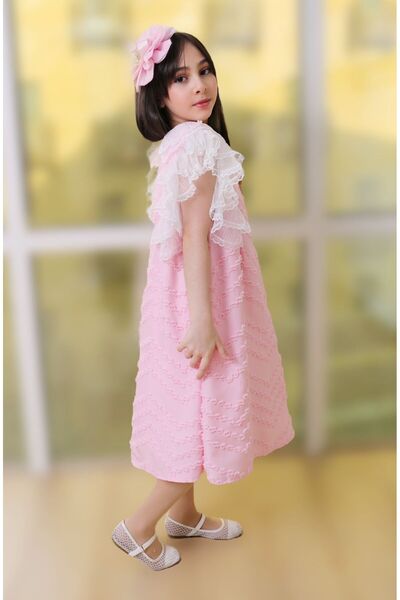 Generic Girls' dress decorated with zigzag stripes and a decorative collar