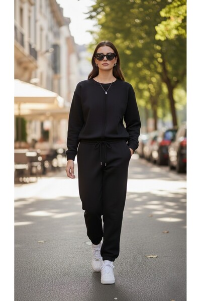 The سترة نسائية سوداء مصنوعة من القطن بنسبة 100% بثلاث خيوط – تصميم عادي مع ت...