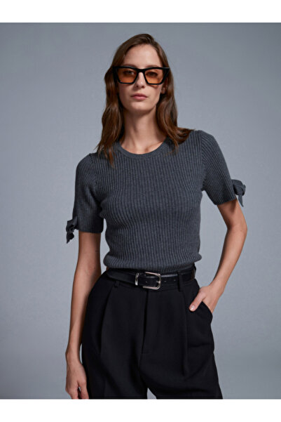 VETTA قماش مجدّل سترة تريكو بتفاصيل فيونكة