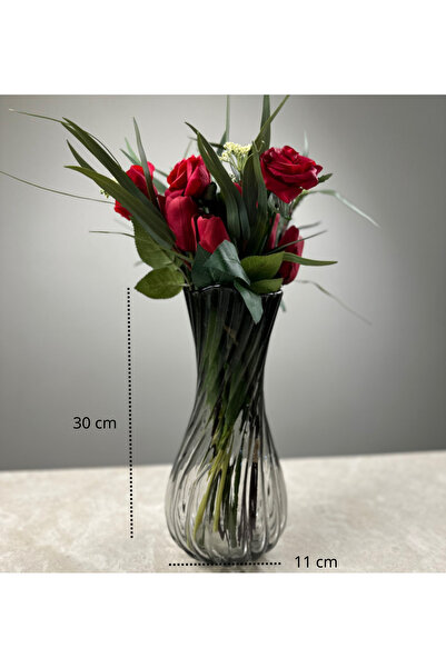 mzhrea A glass vase with a unique and beautiful design