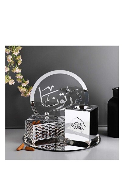 Story of candle A Ramadan Kareem incense burner with a box of incense, a stan...