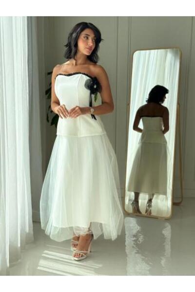Aljouri Off-shoulder dress with flowing tulle skirt
