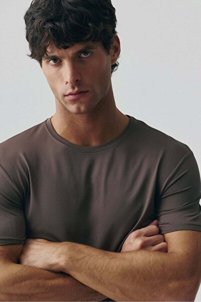 H&M بلوزة رياضية Muscle Fit مع DryMove™