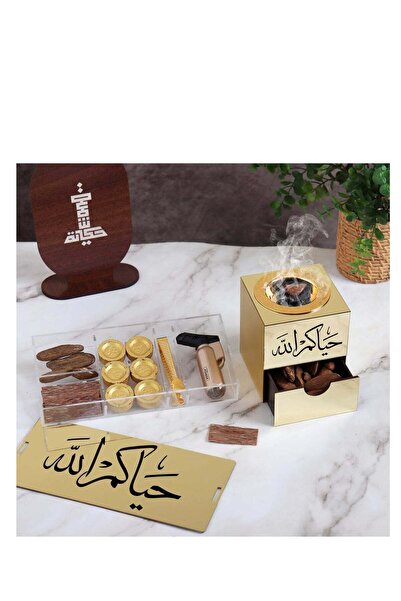 Story of candle Incense burner with a box for storing incense, inscribed with "Welcome," along with Maroki oud, Vietnamese oud chips, a lighter, and charcoal.