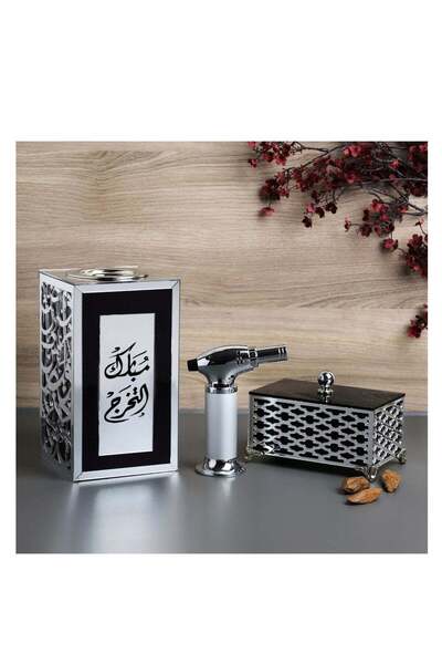 Story of candle An incense burner with a box for storing the incense, bearing the phrase "Congratulations on Graduation," along with Maroki oud and a luxury lighter.