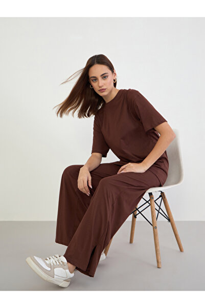 Styli تي شيرت قصة فضفاضة مع بنطال رياضي أرجل واسعة