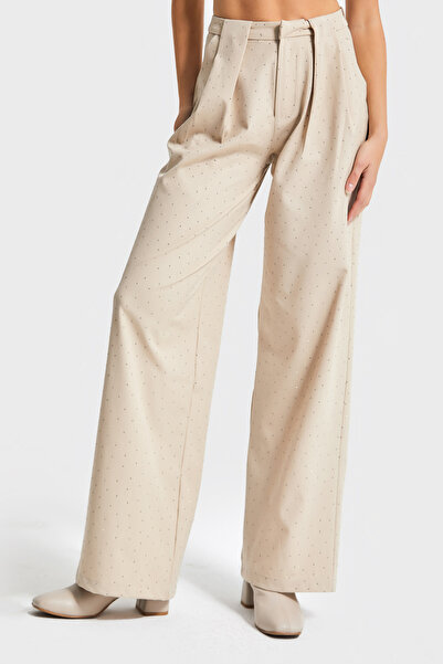 its basic Women's Beige Color Loose Fit Special Design Trousers with Shiny Stones on the Front
