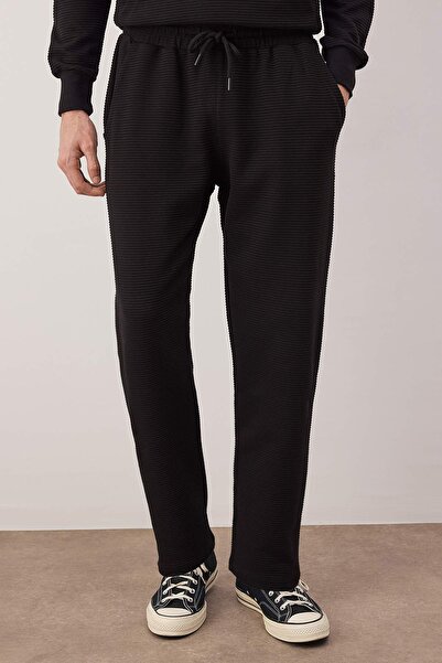Trendyol Collection Black Regular/Normal Cut Textured Pipe Leg Sweatpants Tmnaw26Ea00017