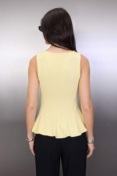 Trendyol Collection Yellow Thick Textured Waist Sit Peplum Zero Sleeve Crew Neck Knitted Blouse Twoaw26Bz00170