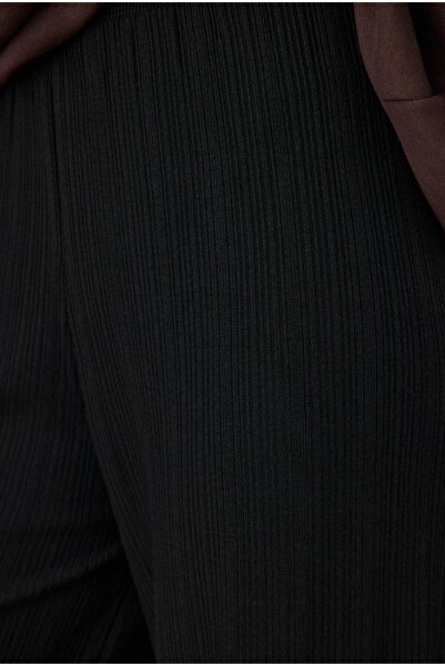 HEQA Чорні трикотажні штани - з стрічковими деталями