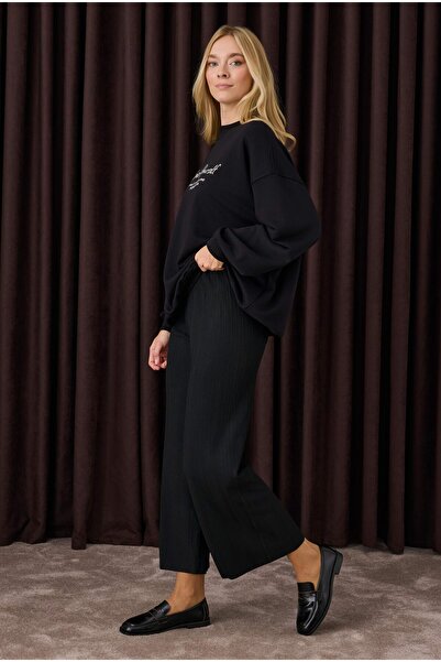 HEQA Чорні трикотажні штани з підкосами