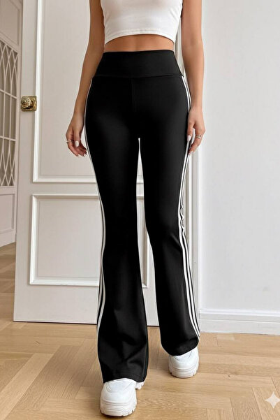 oshebu Dámské elastické legíny ze strečové látky s bočními pruhy a španělským rozšířením nohavic