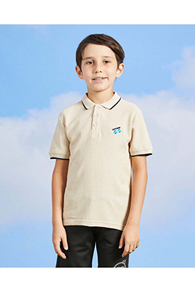 REDTAG قميص بولو مطرز بنقشة تزلج باللون البيج للأولاد