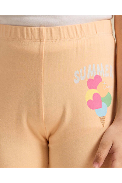 REDTAG Girls Orange Printed Leggings