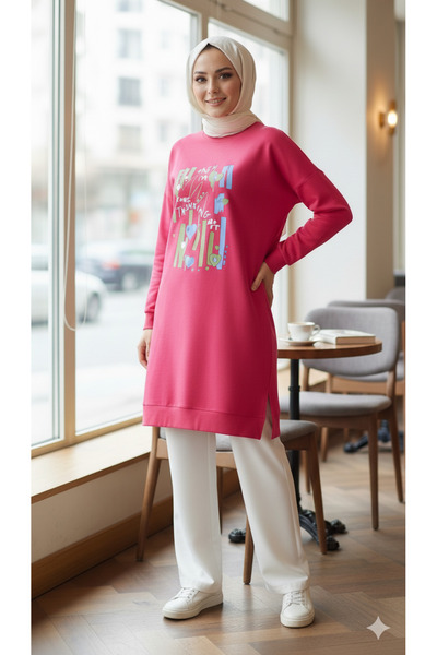 MODEL Pembe taşlı tesettüre uyumlu yanları yırtmaçlı diz üstü tunik
