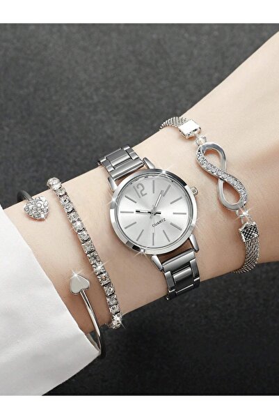VEYA A luxurious four-piece women's set (watch + bracelets) with a modern cas...