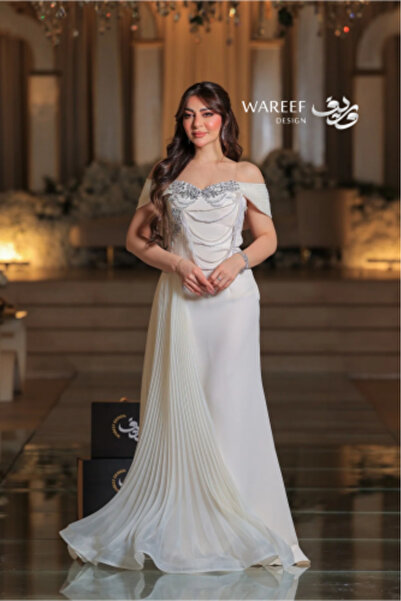 WAREEF FASHION Long Cream Crepe Evening Dress - A-Line Off-Shoulder with Silky Pleats & Hand Embroidery