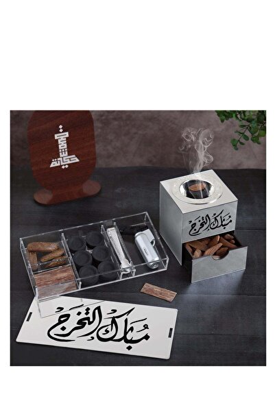 Story of candle Incense burner with a box for storing incense and for the incense itself, bearing the phrase "Congratulations on Graduation," Maroki oud, Vietnamese oud chips, lighter, and charcoal.