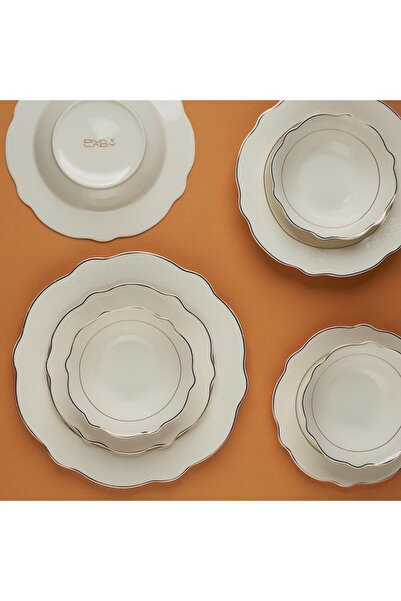DIVA LADY A luxurious porcelain dinnerware set with an elegant wavy design – 24 pieces