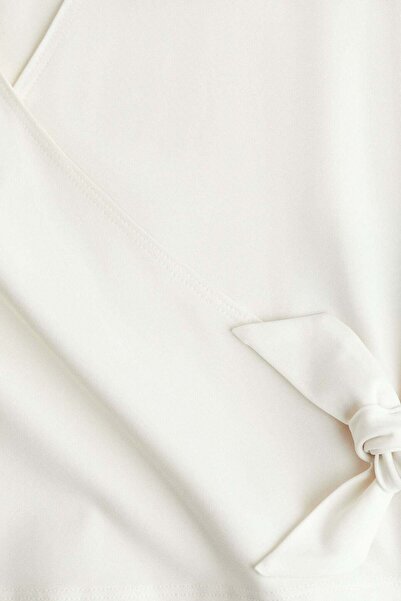 H&M Sports wrap top with SoftMove™