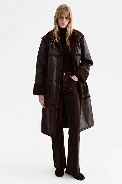 H&M بنطلون مخملي واسع الأرجل