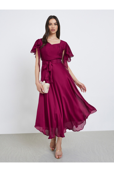 Maxim Creation By Styli Pencil dress In Silk finish fabric with belt and curly sleeves